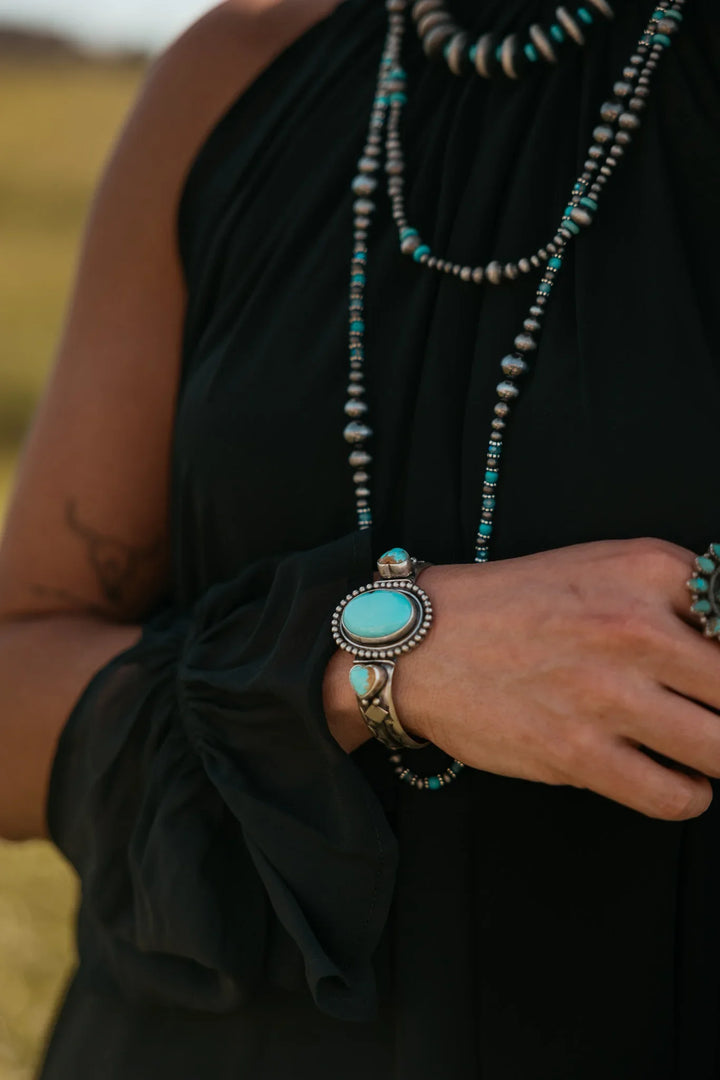 El brazalete de corazón turquesa