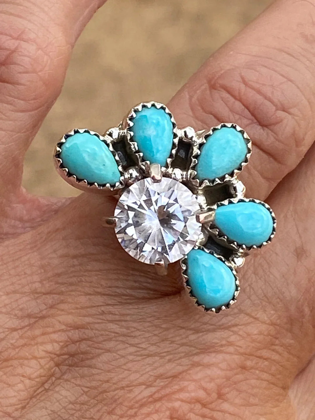 Turquoise and silver western ring with large clear gemstone on hand, boho jewelry style