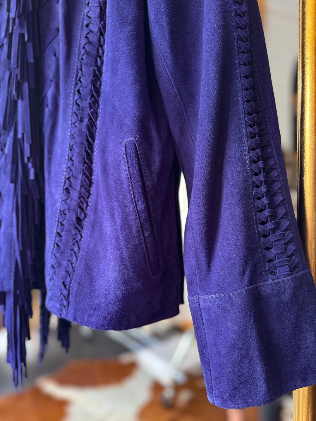 Purple suede western jacket with fringe and braided trim details, boho cowgirl style